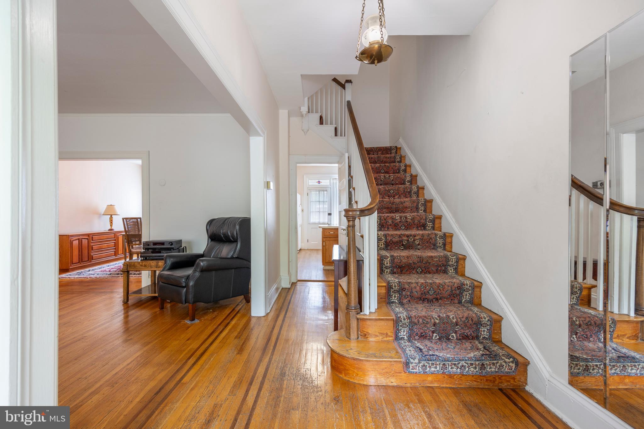 3936 Cloverhill Road Baltimore, MD 21218 - Photo 3 of 37 a view of entryway and hall with wooden floor