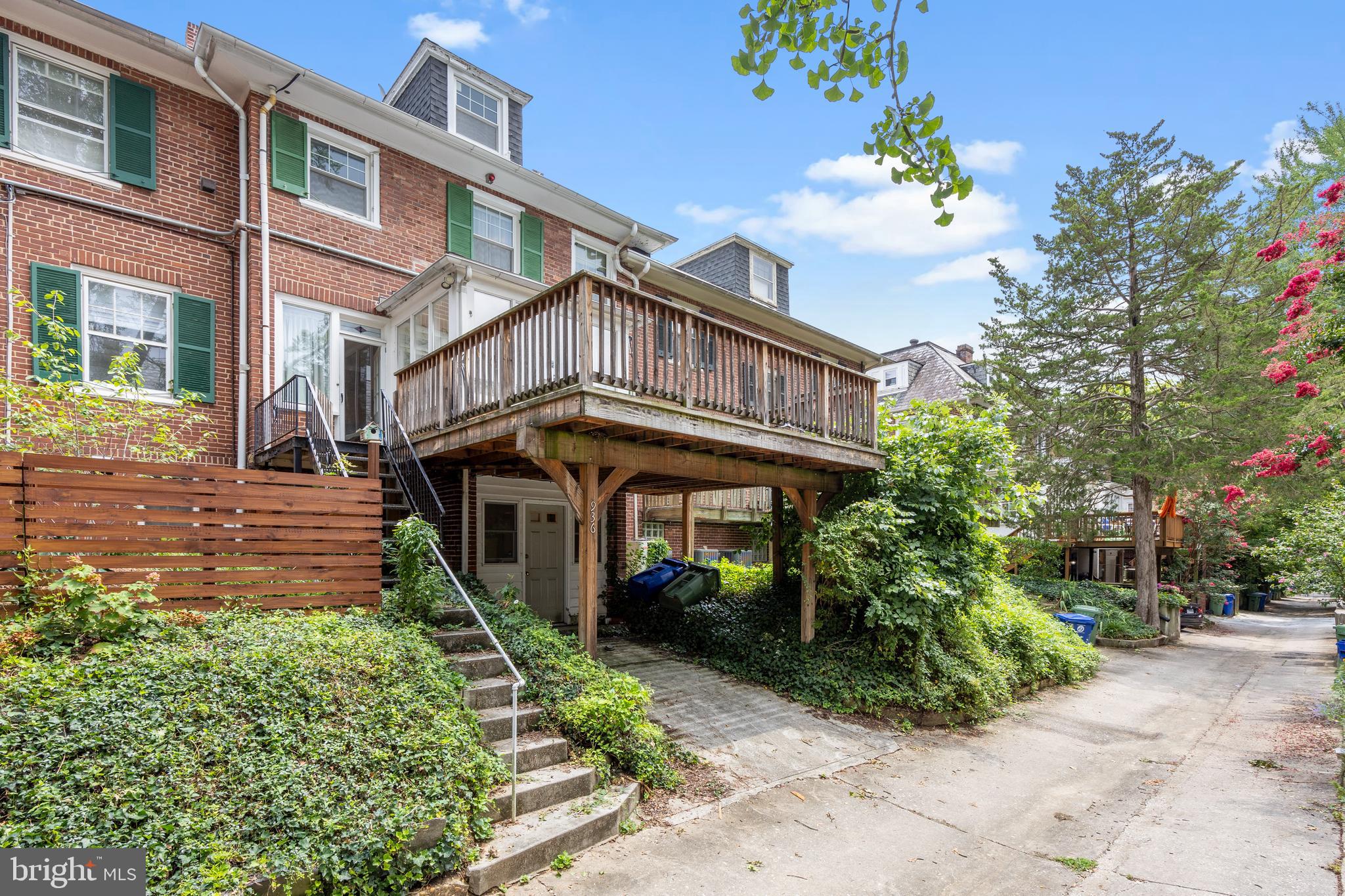 3936 Cloverhill Road Baltimore, MD 21218 - Photo 37 of 37 a front view of a house with garden