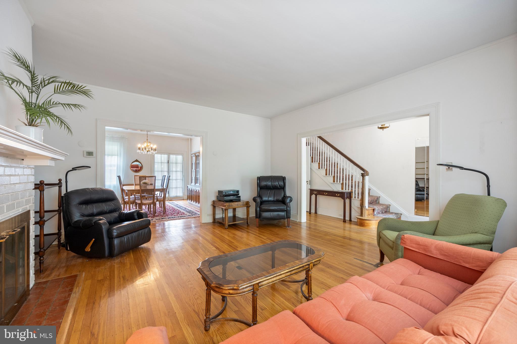 3936 Cloverhill Road Baltimore, MD 21218 - Photo 7 of 37 a living room with furniture and a view of kitchen