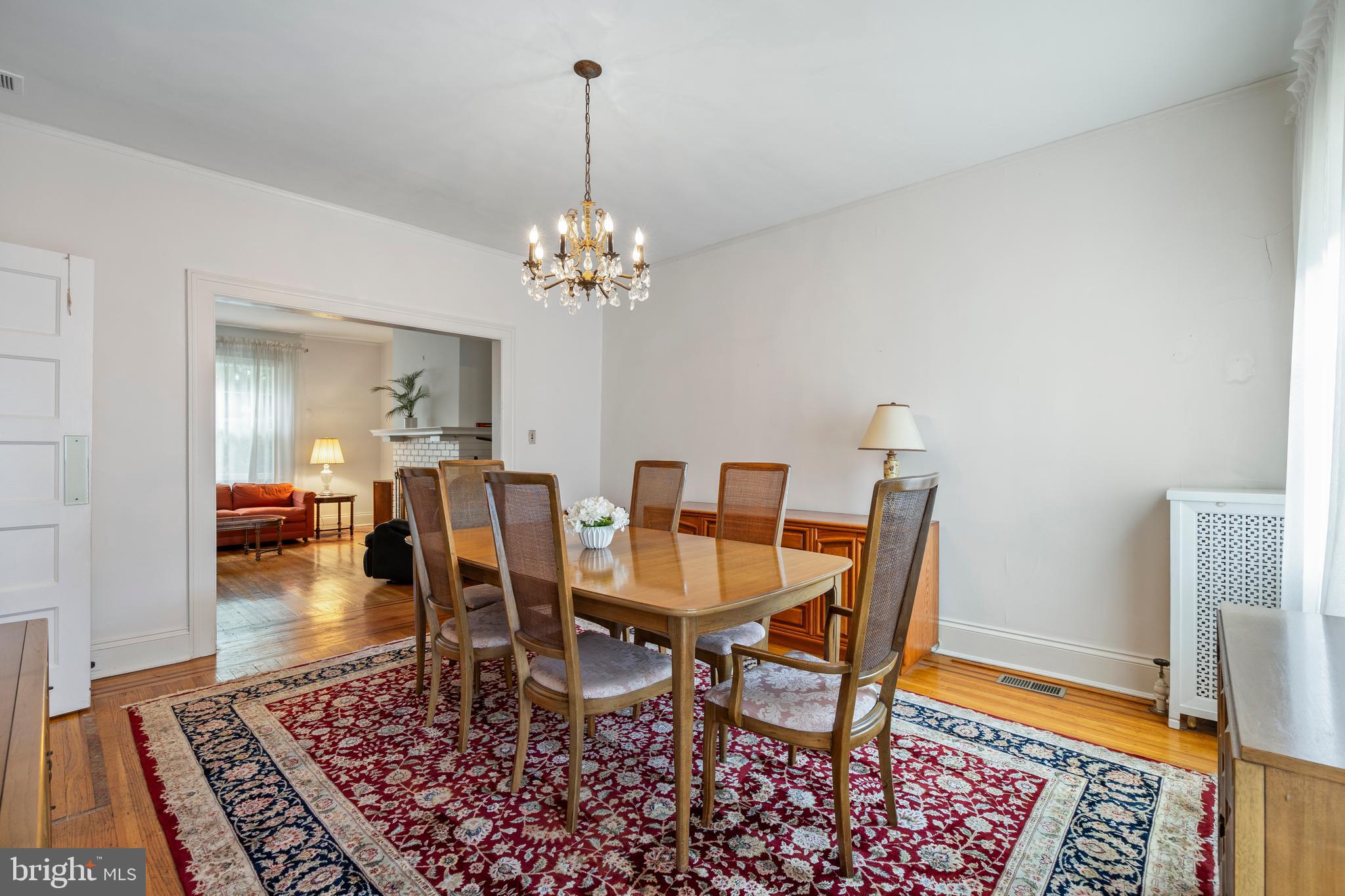 3936 Cloverhill Road Baltimore, MD 21218 - Photo 9 of 37 a view of a dining room with furniture