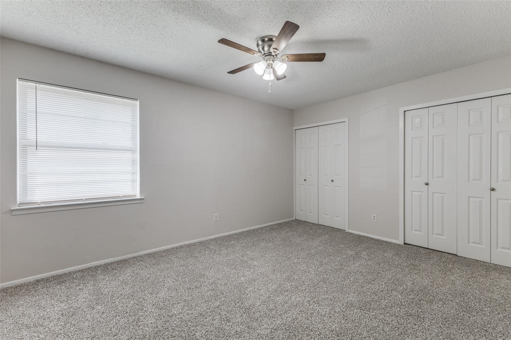 3921 Ambassador Way Balch Springs, TX 75180 - Photo 12 of 25 a view of an empty room with a window