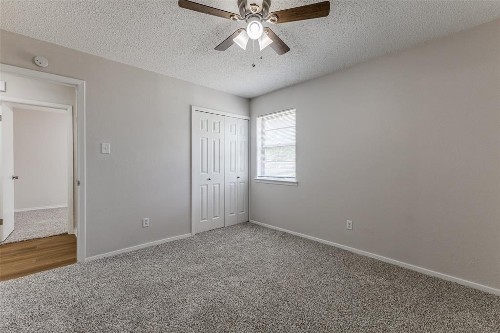 3921 Ambassador Way Balch Springs, TX 75180 - Photo 18 of 25 a view of an empty room and window