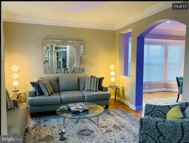 a living room with furniture and a couch