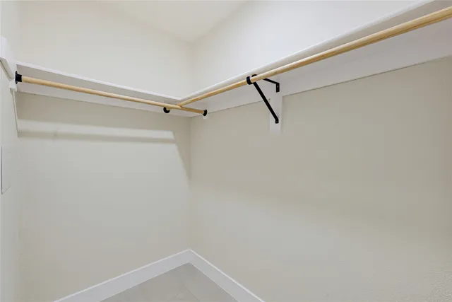 a view of a room with racks on the wall