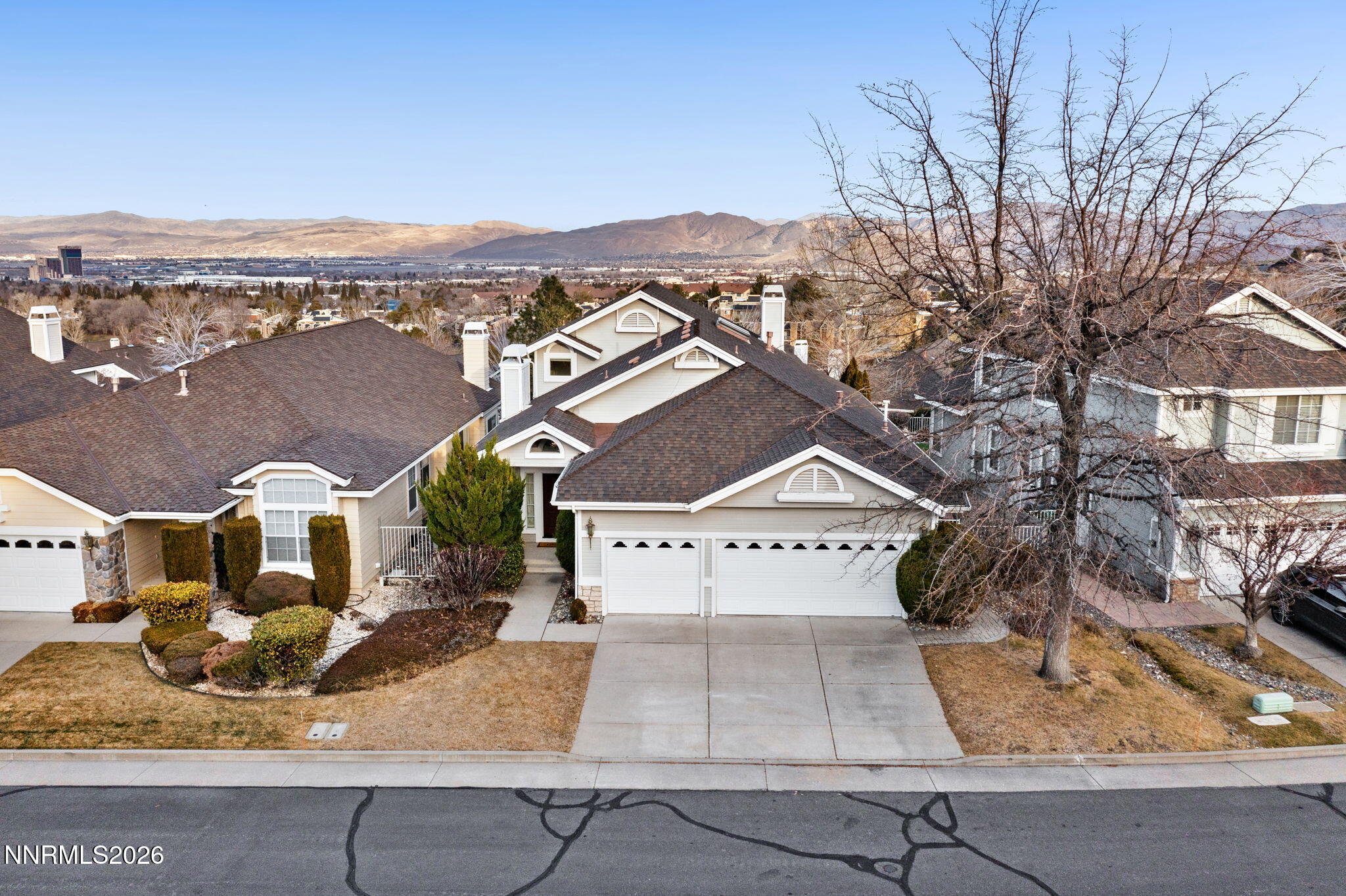 6186 Squires Lane Reno, NV 89519 - Photo 50 of 57 an aerial view of a house with a yard