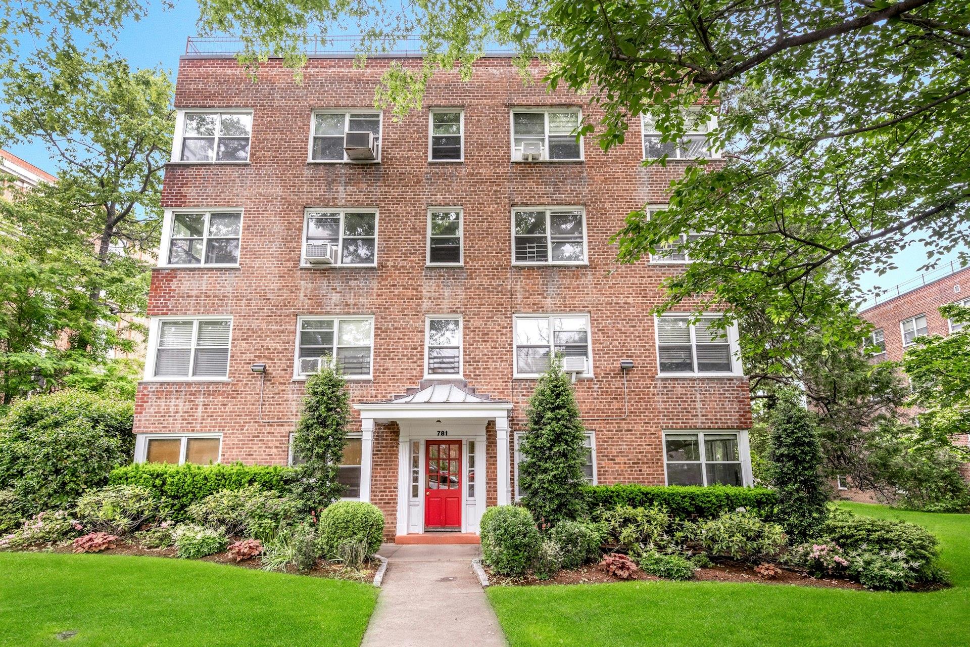 781 Palmer Road, Unit 2F Bronxville, NY 10708 - Photo 1 of 1 a front view of a house with garden