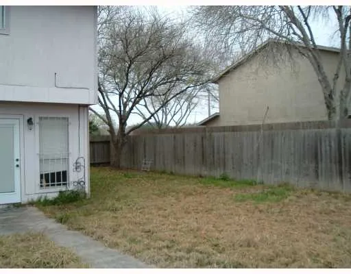 a view of backyard of house