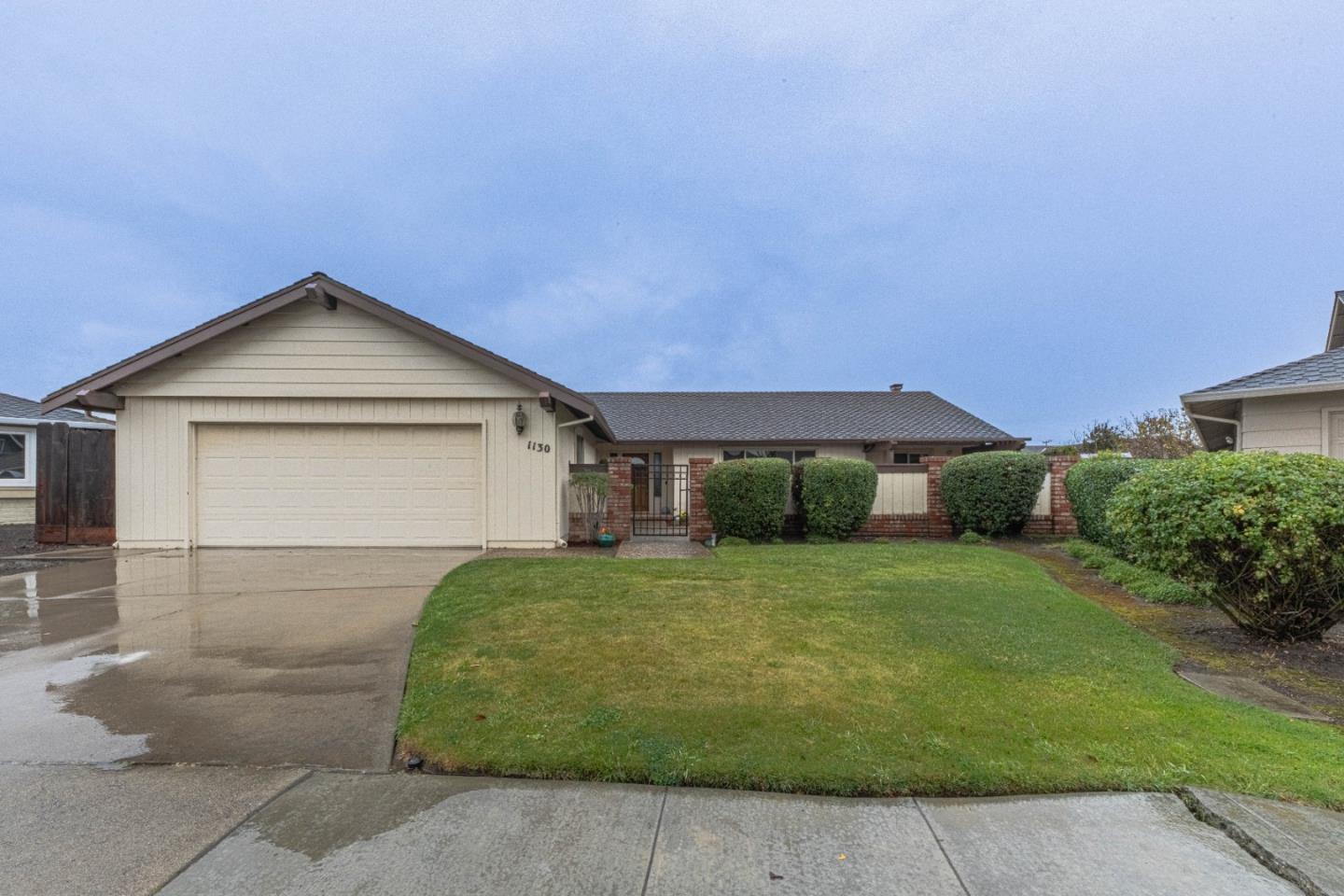 1130 Montecito Circle Salinas, CA 93901 - Photo 1 of 32 a front view of a house with a yard
