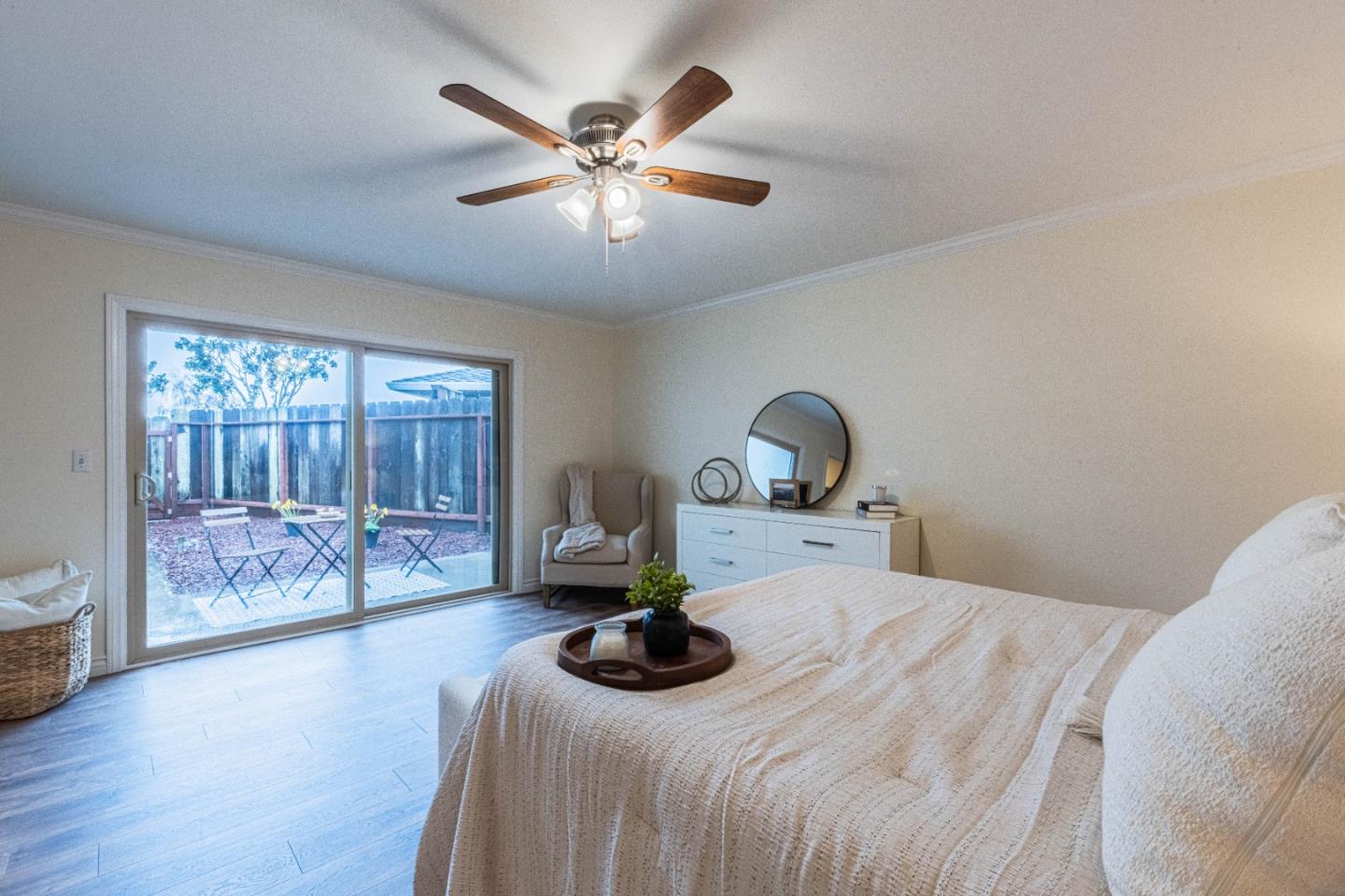 1130 Montecito Circle Salinas, CA 93901 - Photo 18 of 32 a bedroom with a bed and wooden floor