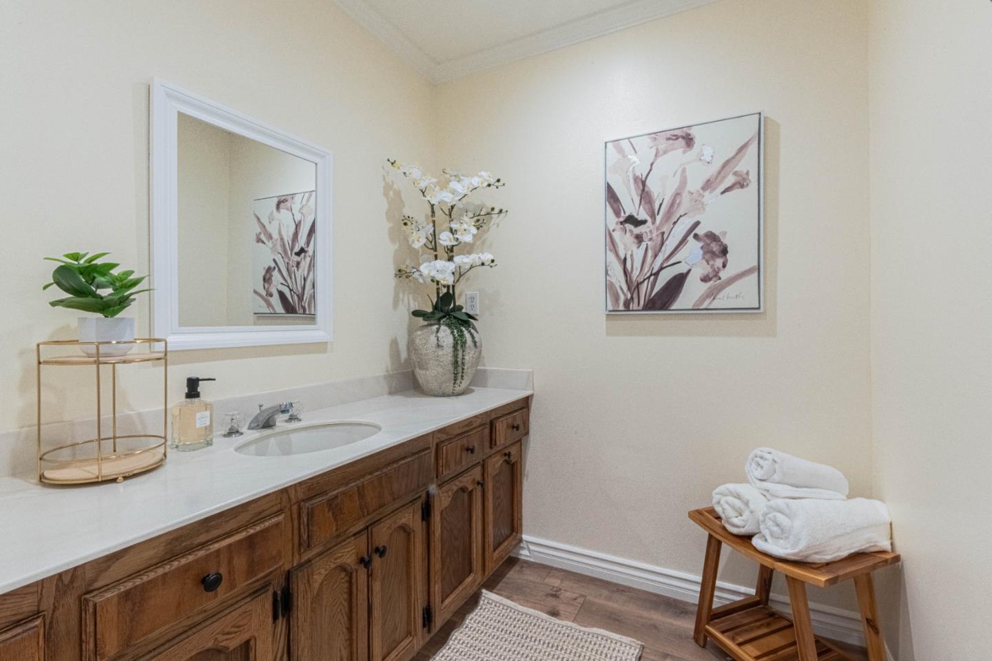 1130 Montecito Circle Salinas, CA 93901 - Photo 21 of 32 a bathroom with a sink and a mirror