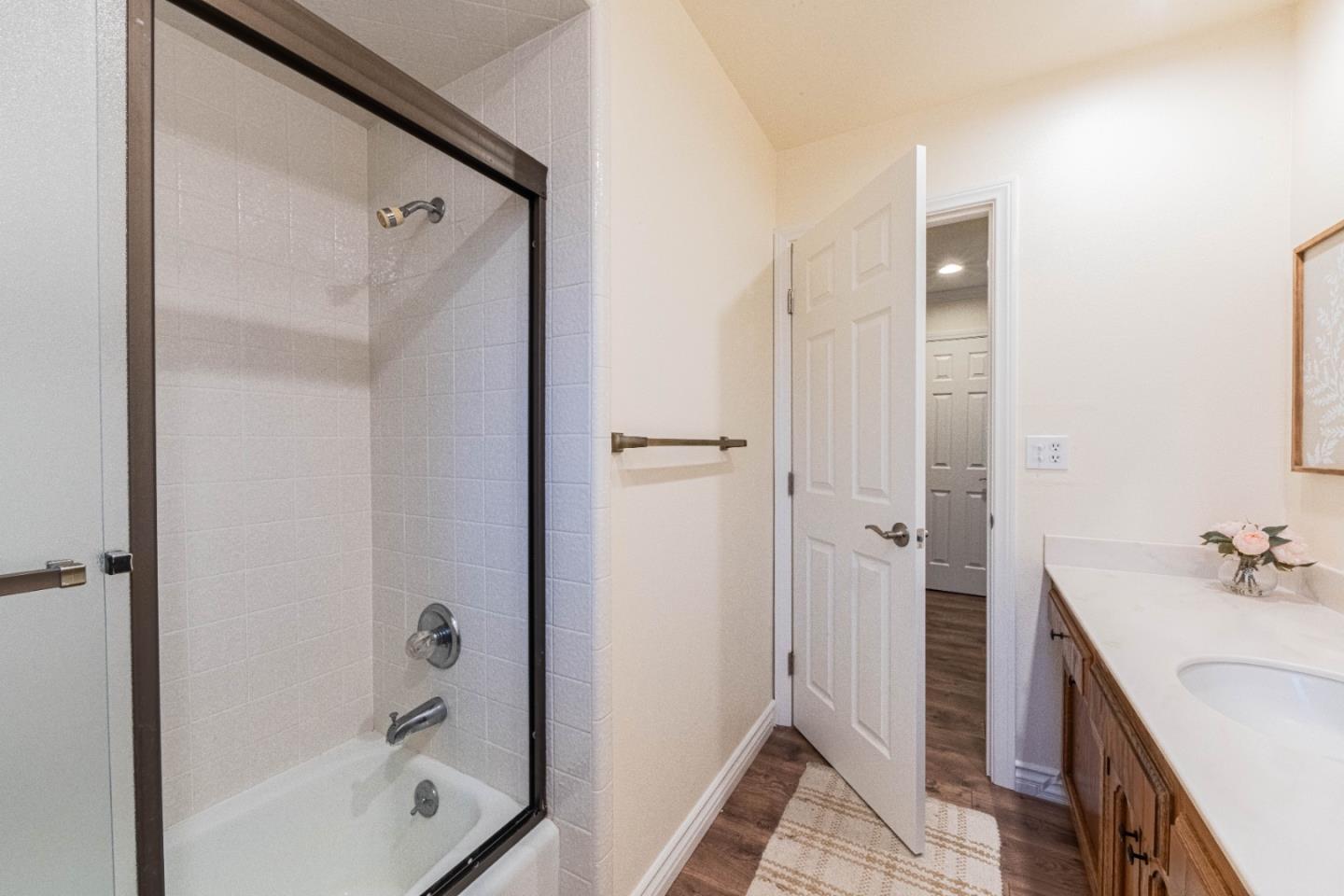 1130 Montecito Circle Salinas, CA 93901 - Photo 28 of 32 a bathroom with a tub sink shower and mirror