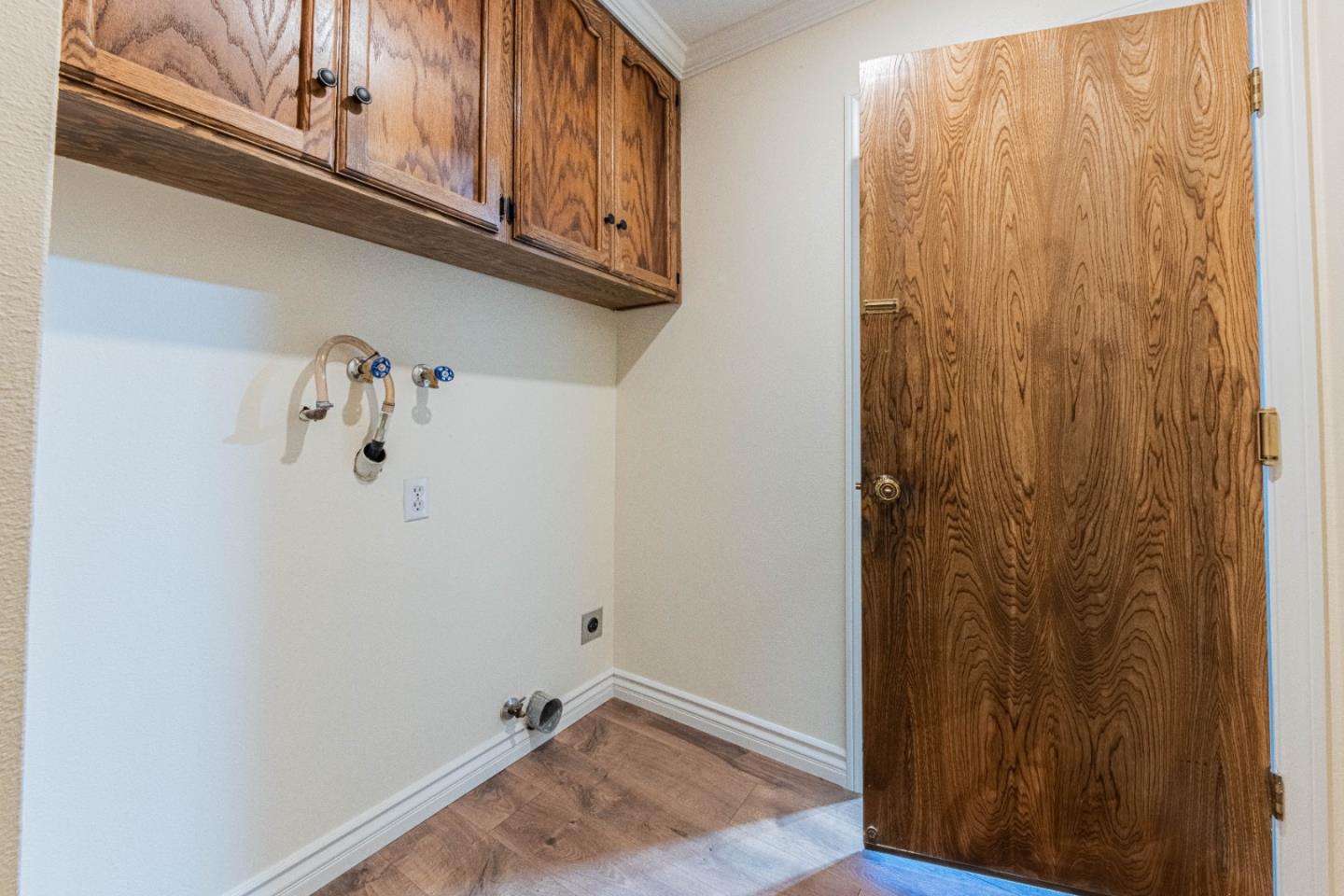 1130 Montecito Circle Salinas, CA 93901 - Photo 29 of 32 a view of a room with rack on the wall
