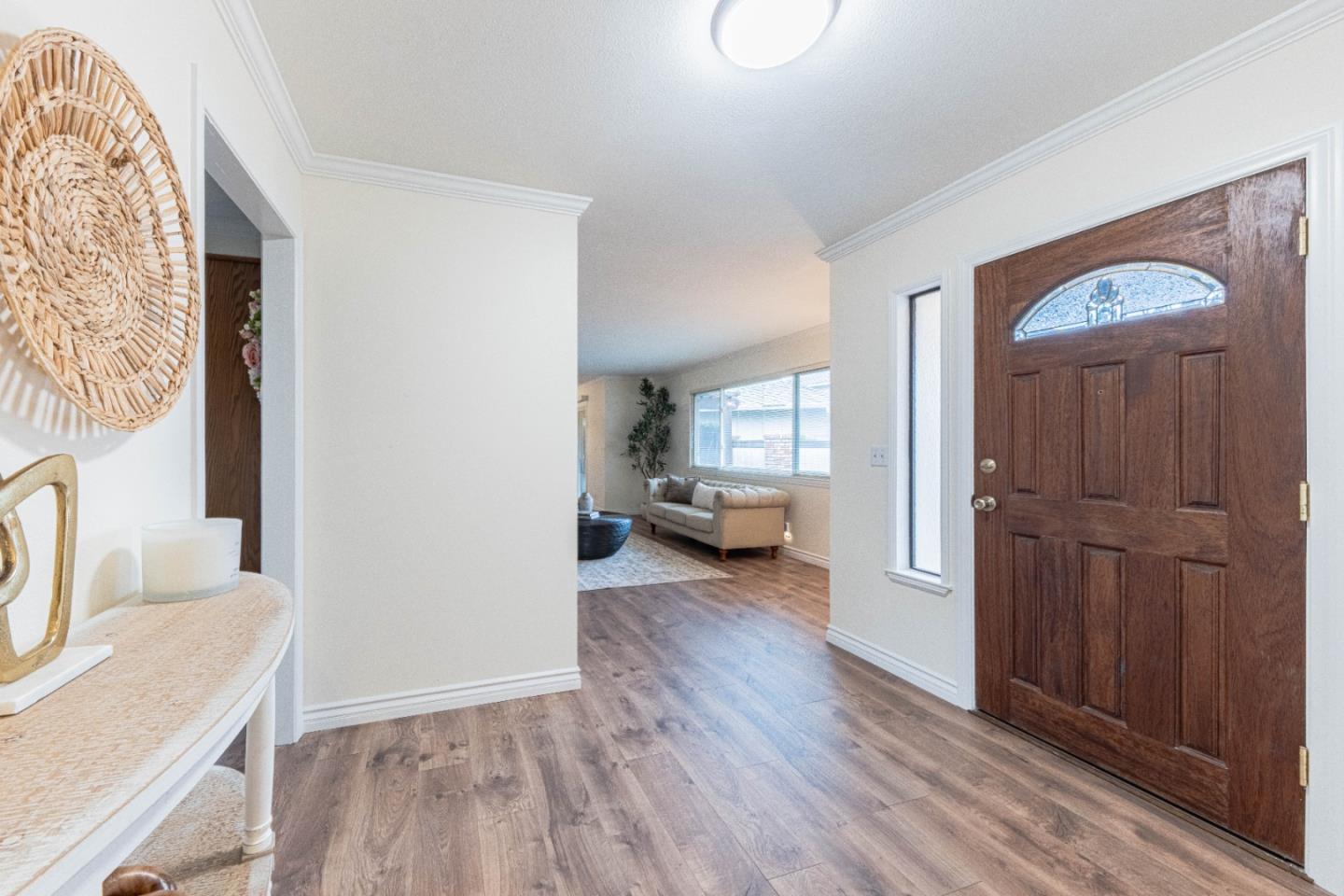 1130 Montecito Circle Salinas, CA 93901 - Photo 5 of 32 a view of a livingroom with wooden floor and furniture
