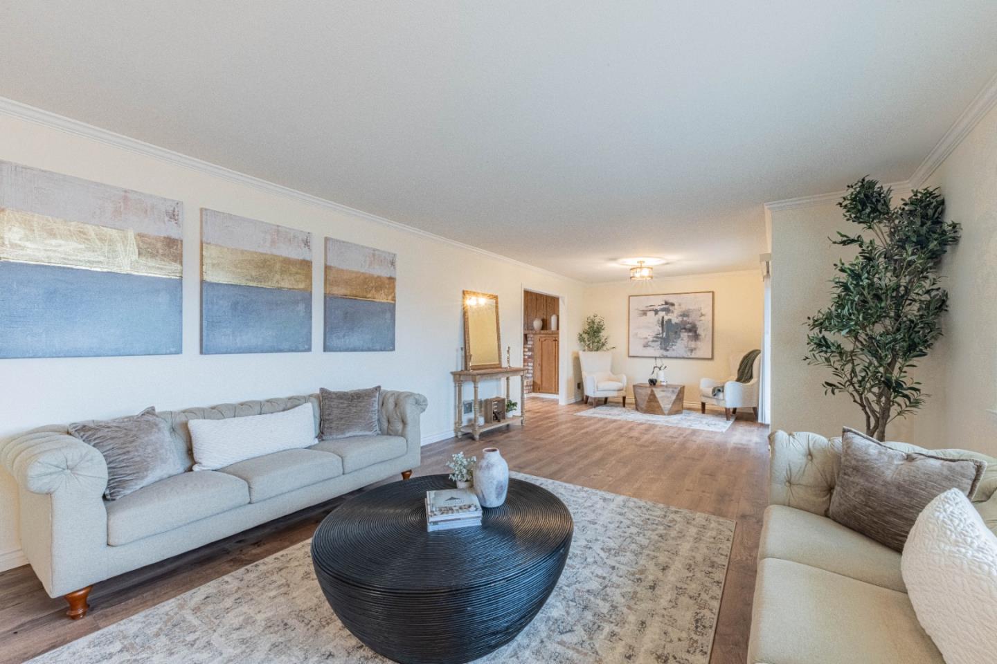 1130 Montecito Circle Salinas, CA 93901 - Photo 6 of 32 a living room with furniture and a potted plant