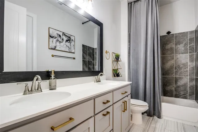 a view of a patio with a table and chairs