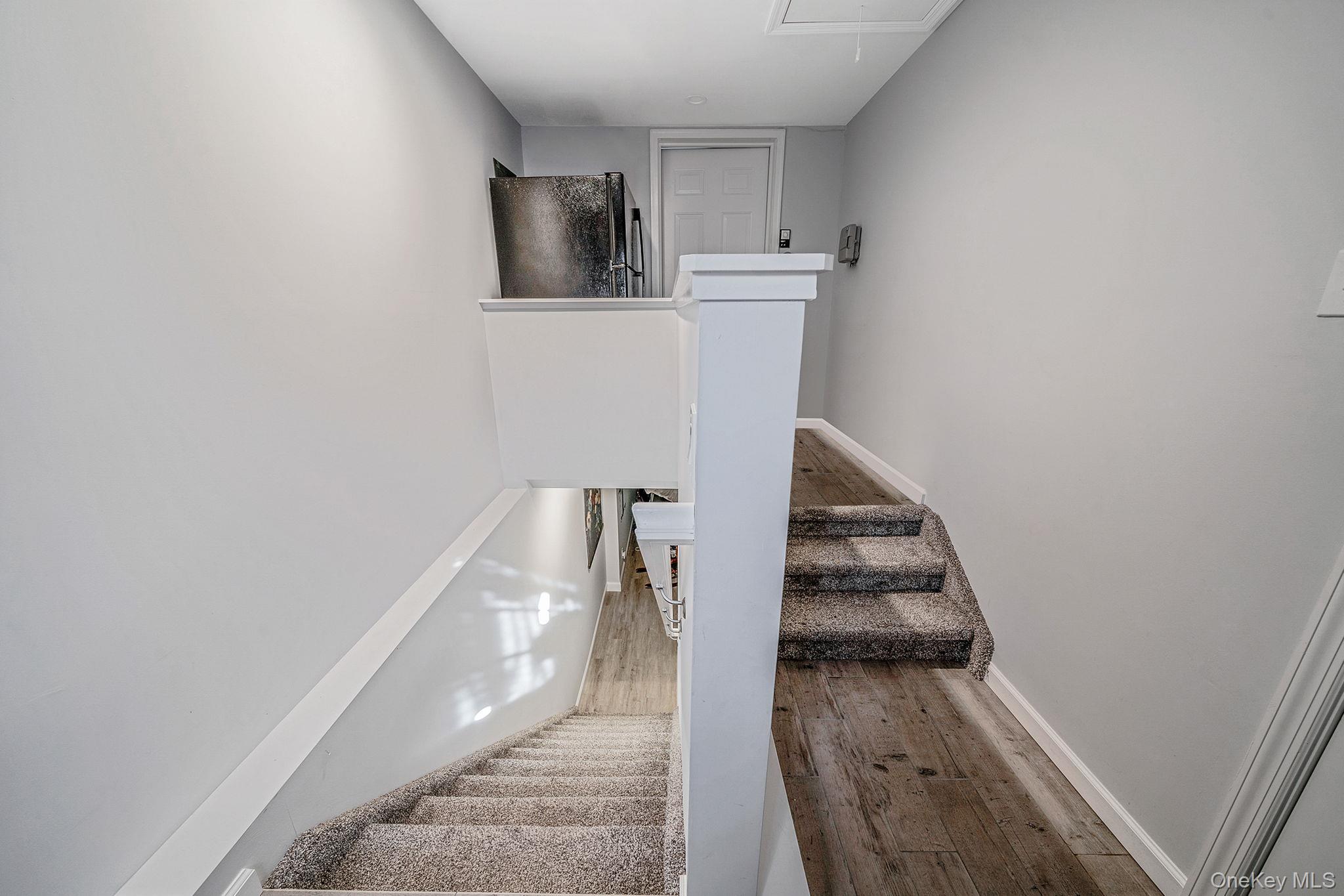 1407 Middle Road, Unit 258 Calverton, NY 11933 - Photo 34 of 50 a view of entryway and kitchen