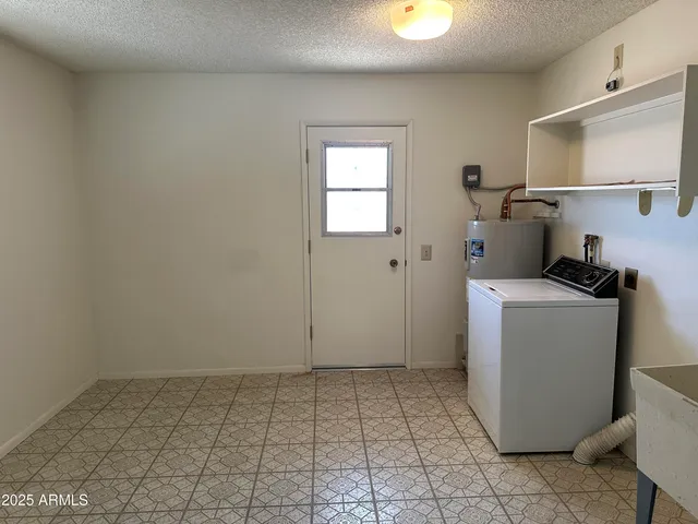 a view of a hallway with windows