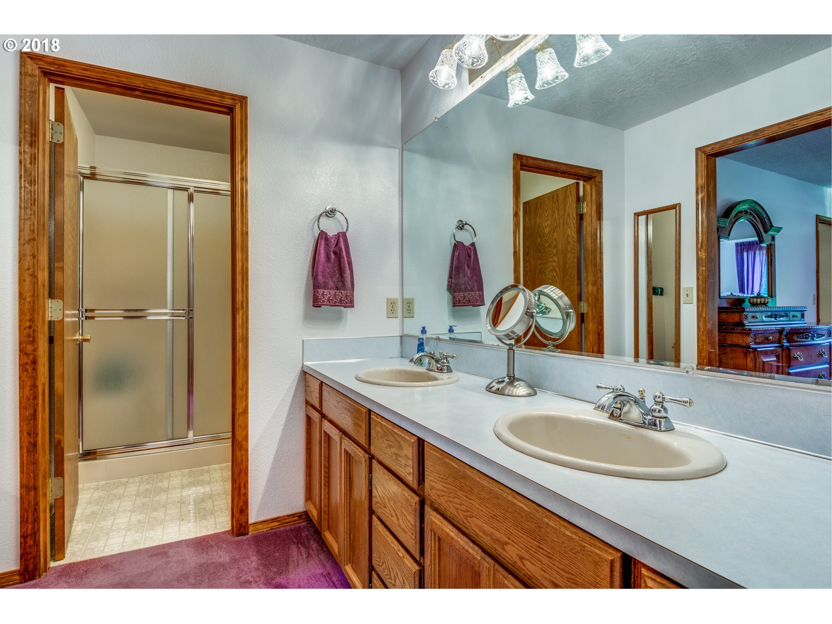 35133 Southeast Homan Road Gresham, OR 97080 - Photo 18 of 32 a bathroom with a sink vanity and a mirror