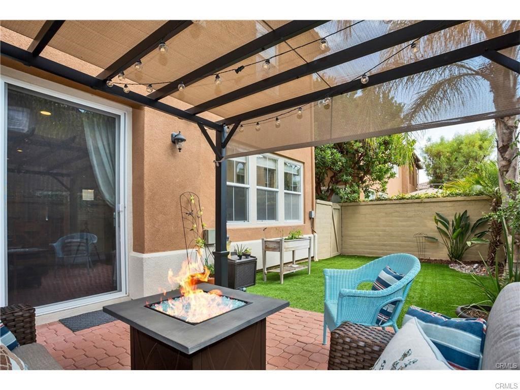 21 Corte Javier San Clemente, CA 92673 - Photo 14 of 32 a backyard of a house with outdoor seating