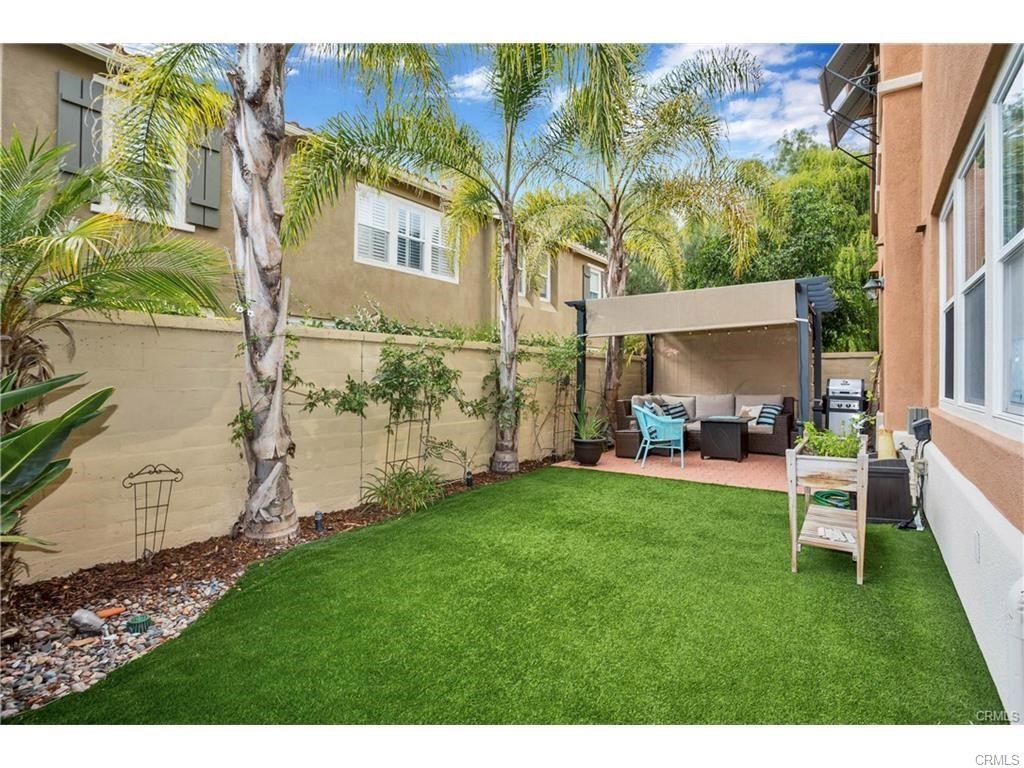 21 Corte Javier San Clemente, CA 92673 - Photo 15 of 32 a backyard of a house with table and chairs