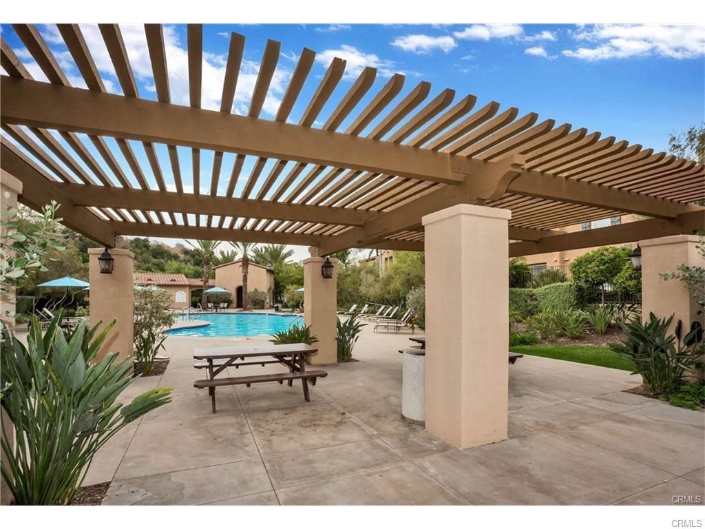 21 Corte Javier San Clemente, CA 92673 - Photo 25 of 32 a backyard of a house with garden barbeque oven table and chairs