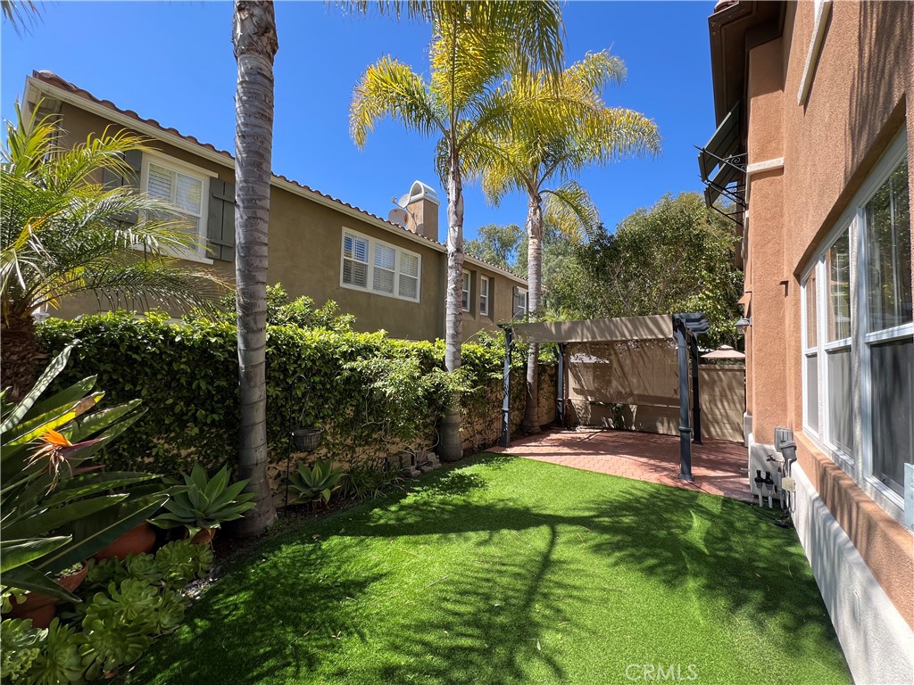 21 Corte Javier San Clemente, CA 92673 - Photo 30 of 32 a view of a chair and table in backyard