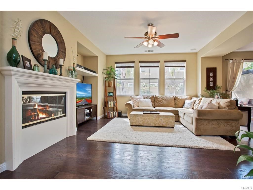 21 Corte Javier San Clemente, CA 92673 - Photo 9 of 32 a living room with furniture and a fireplace