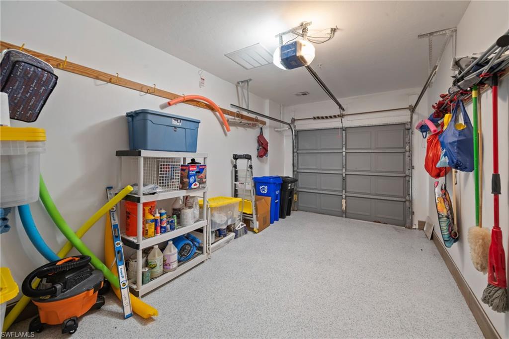 261 Colonade Circle, Unit 2701 Naples, FL 34103 - Photo 36 of 49 a children room with toys and a fan