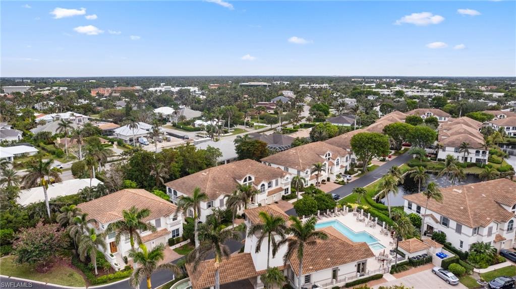 261 Colonade Circle, Unit 2701 Naples, FL 34103 - Photo 45 of 49 an aerial view of a city