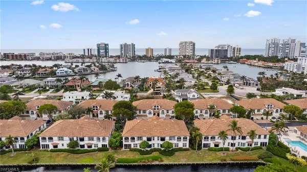 an aerial view of a city with lots of residential buildings