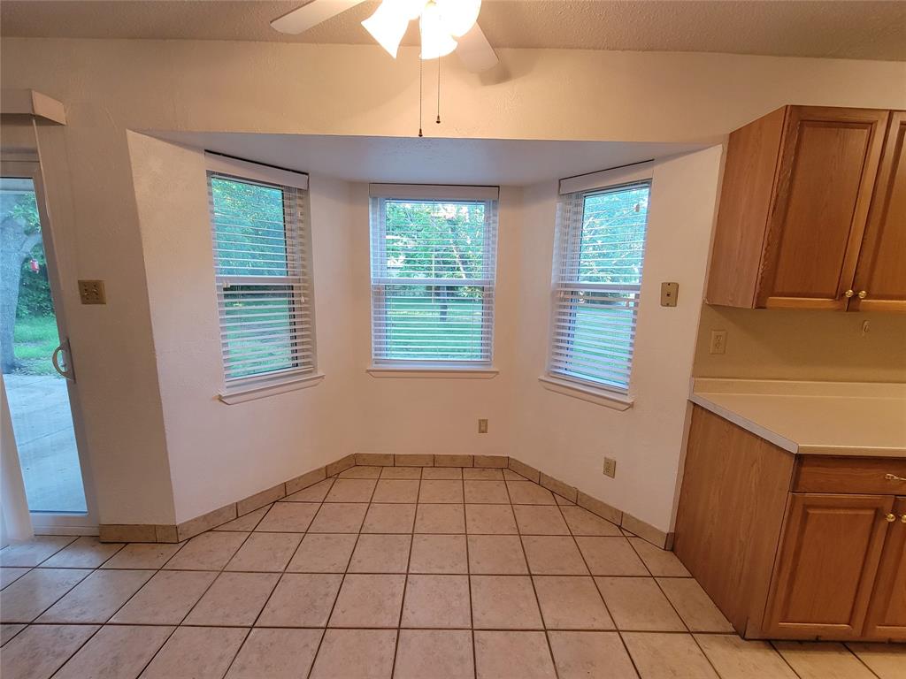 1000 Springdale Road Bedford, TX 76021 - Photo 9 of 36 Breakfast nook looks out to the green backyard.