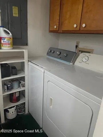 a view of a house with pool and garden