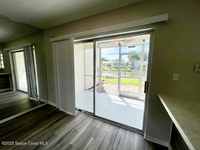 a bathroom with a toilet a sink and a mirror