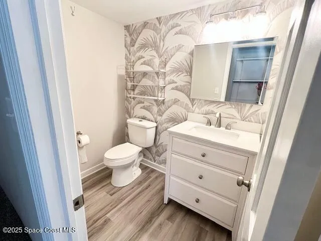 a view living room with wooden floor and window