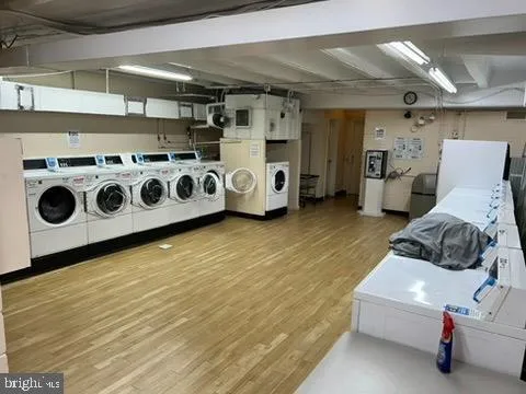 a view of lawn chairs and tables in the patio