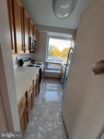 1425 4th Street Southwest, Unit A304 Washington, DC 20024 - Photo 14 of 25 a bathroom with a tub sink and mirror
