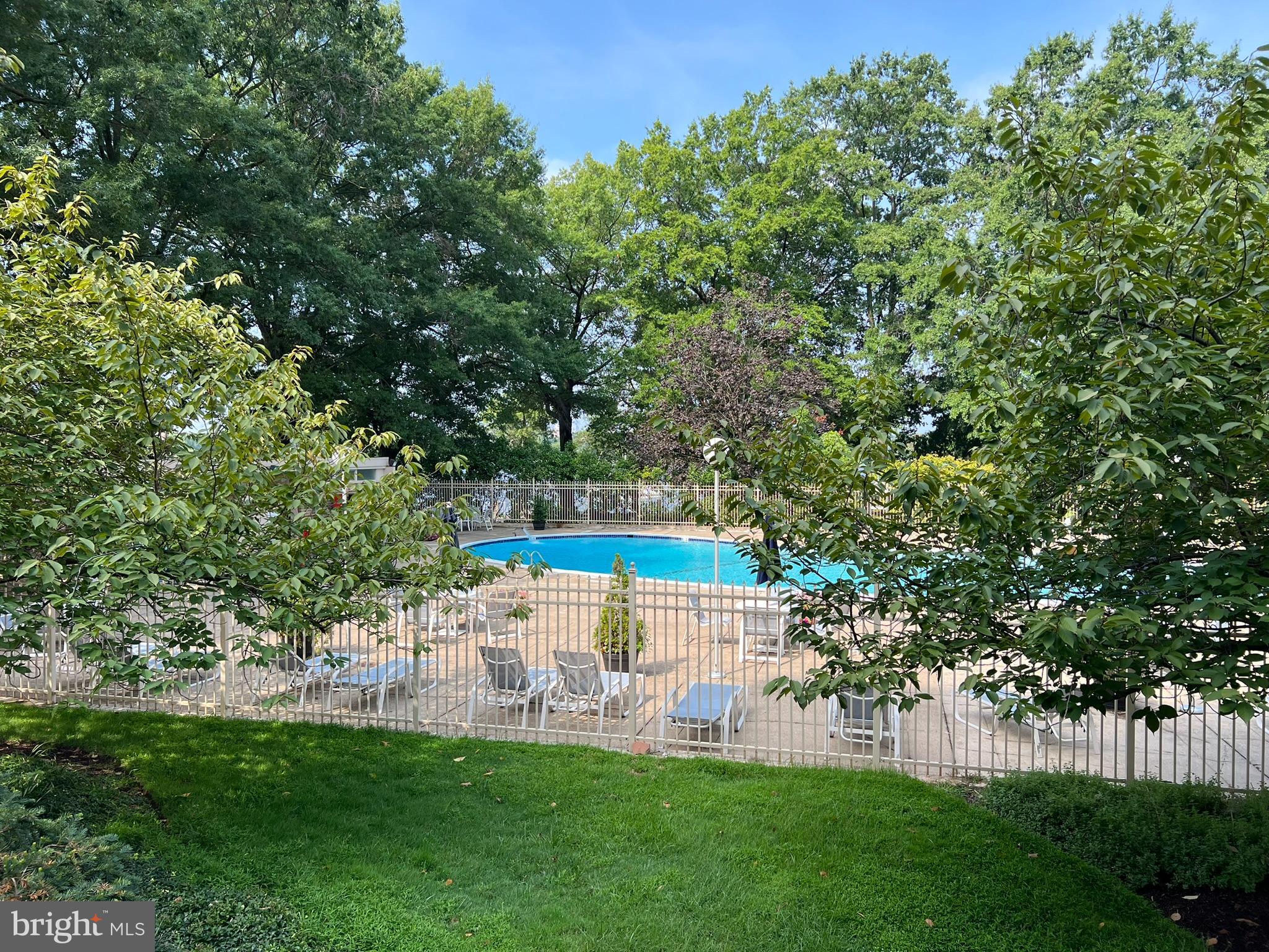 1425 4th Street Southwest, Unit A304 Washington, DC 20024 - Photo 24 of 25 a view of a house with a backyard and a patio