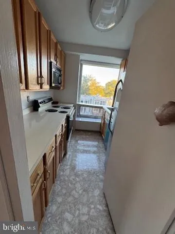 an empty room with an entrance and door