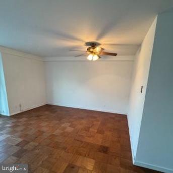 1425 4th Street Southwest, Unit A304 Washington, DC 20024 - Photo 7 of 25 an empty room with a chandelier fan