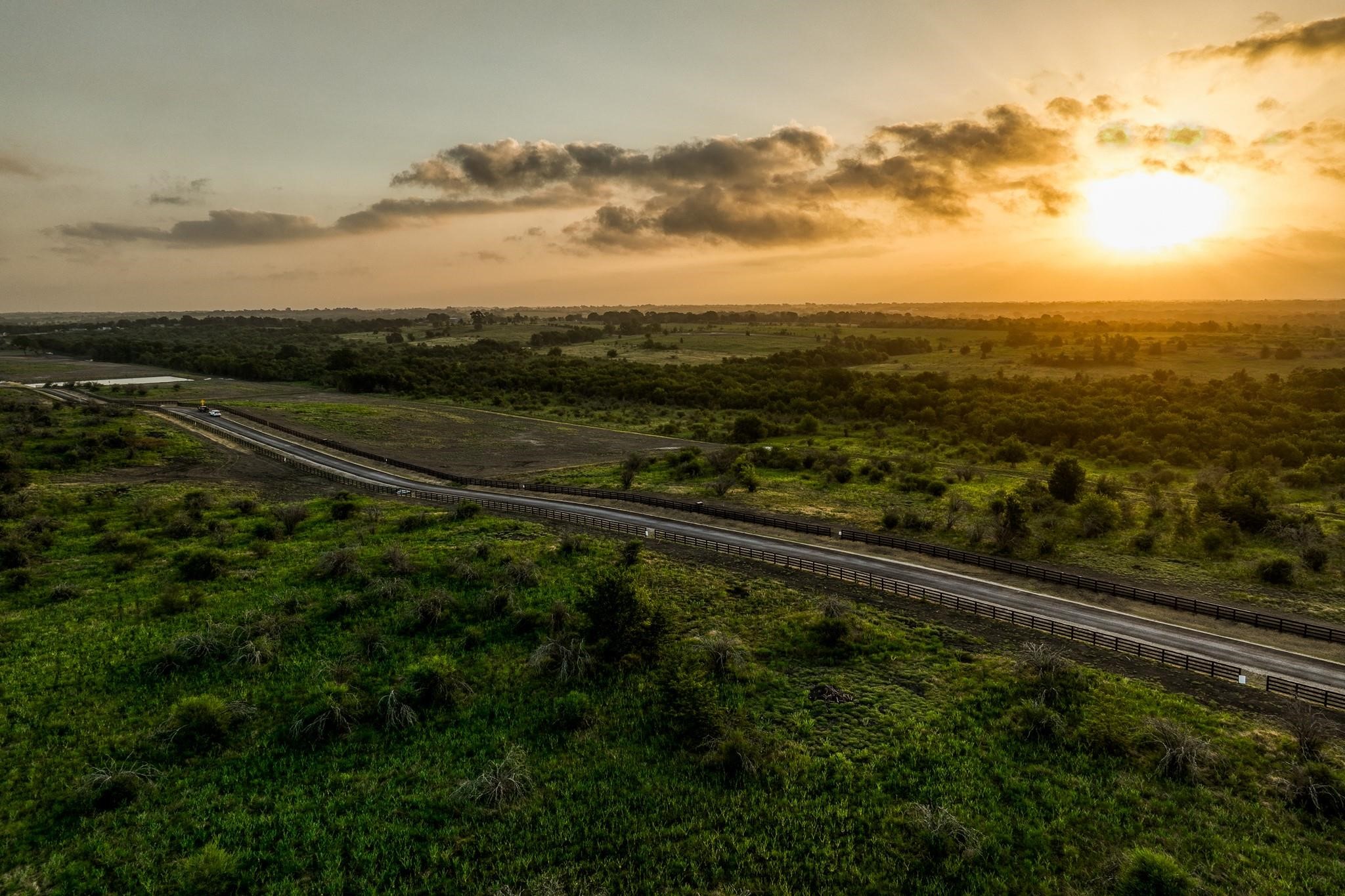 14936 Childress Rnch Drive Washington, TX 77880 - Photo 13 of 13 a view of a street with an ocean view