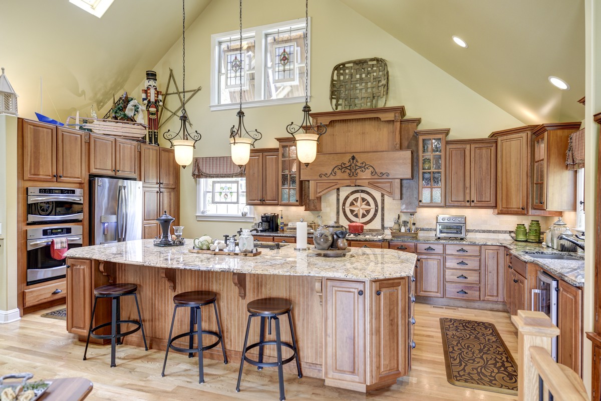 1069 Edgewater Circle Gallatin, TN 37066 - Photo 13 of 43 a very nice looking kitchen with a table and chairs in it