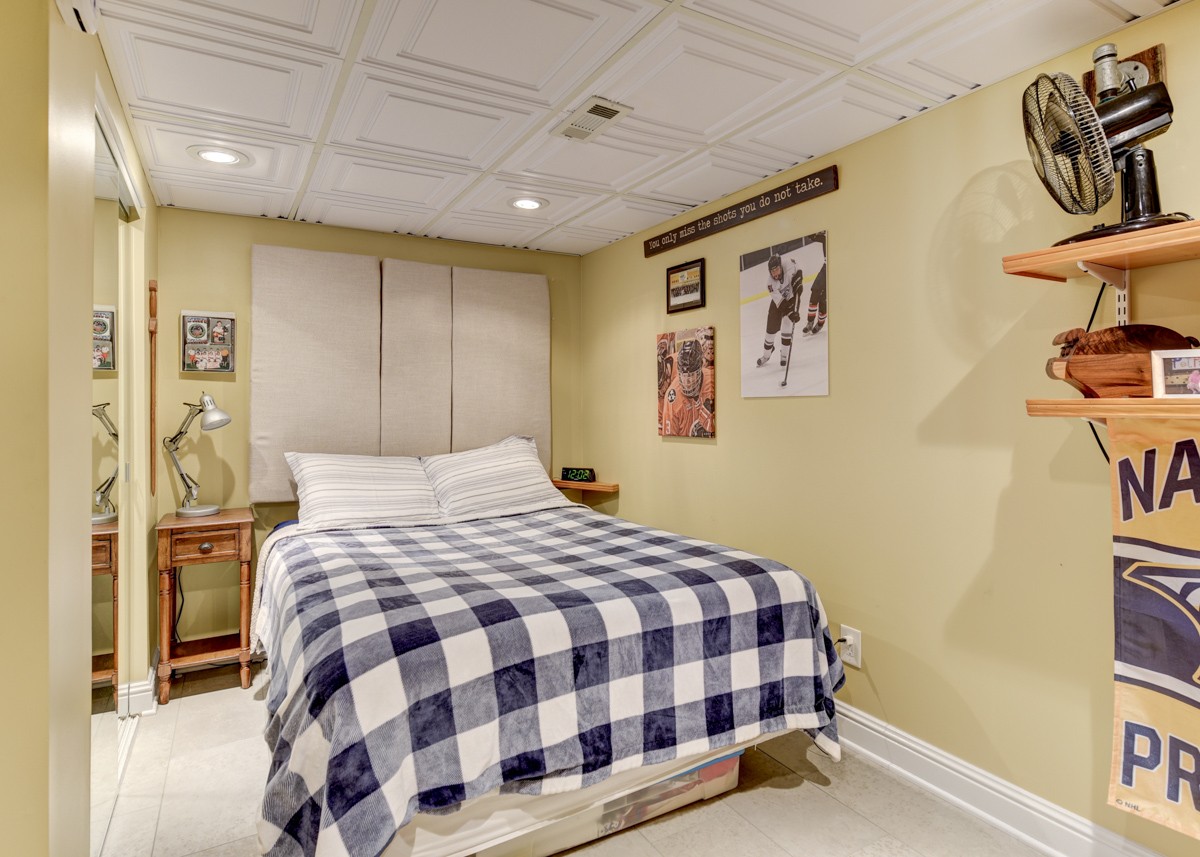 1069 Edgewater Circle Gallatin, TN 37066 - Photo 26 of 43 a bedroom with a bed and a painting on the wall