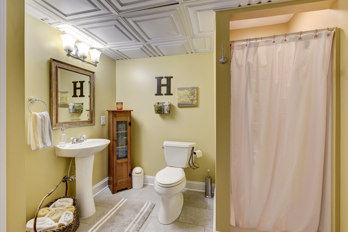 1069 Edgewater Circle Gallatin, TN 37066 - Photo 27 of 43 a bathroom with a sink toilet and shower