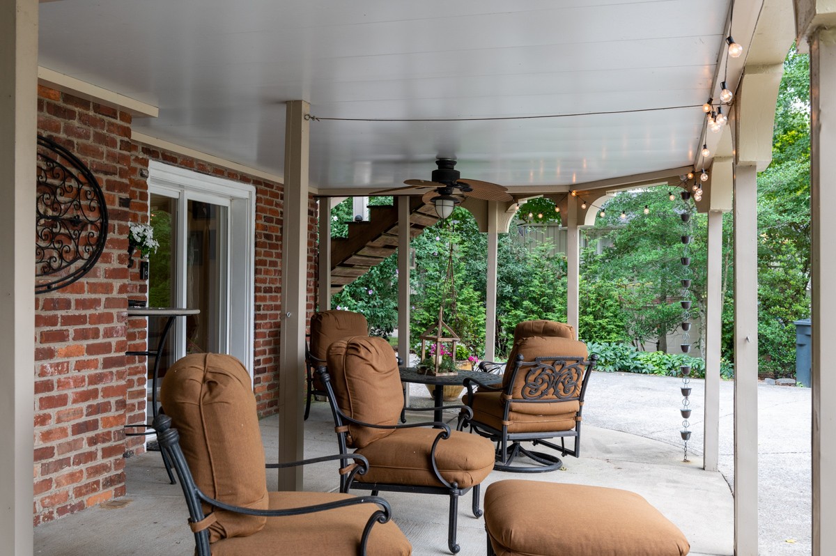 1069 Edgewater Circle Gallatin, TN 37066 - Photo 33 of 43 a view of a patio with chairs and a yard