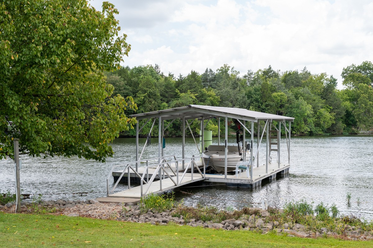 1069 Edgewater Circle Gallatin, TN 37066 - Photo 36 of 43 a view of a backyard with wooden fence