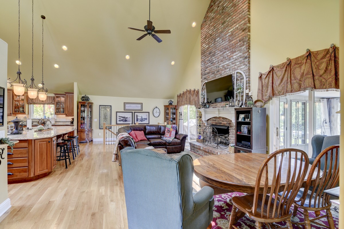 1069 Edgewater Circle Gallatin, TN 37066 - Photo 5 of 43 a living room with fireplace furniture and a flat screen tv