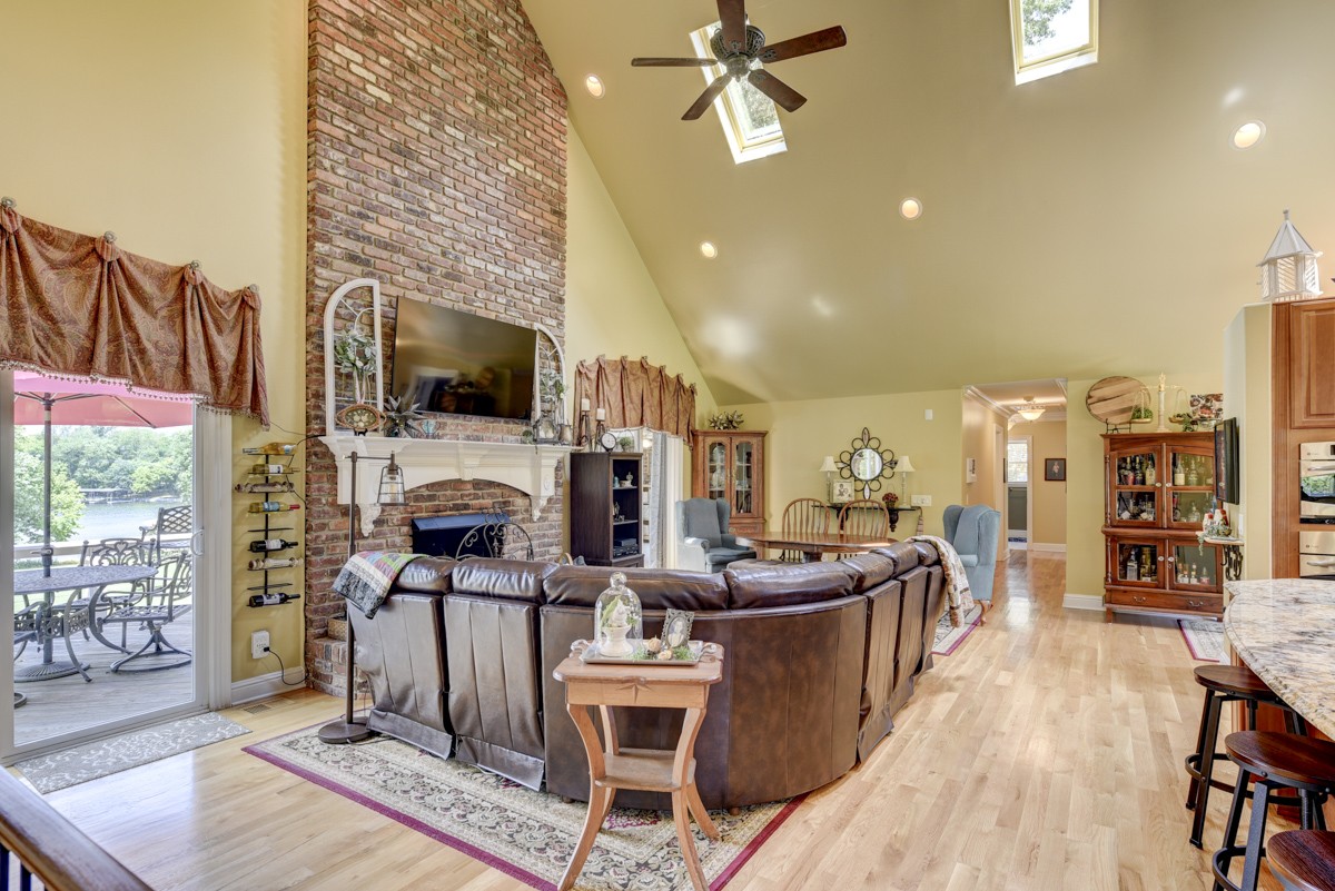 1069 Edgewater Circle Gallatin, TN 37066 - Photo 8 of 43 a living room with fireplace furniture and a flat screen tv