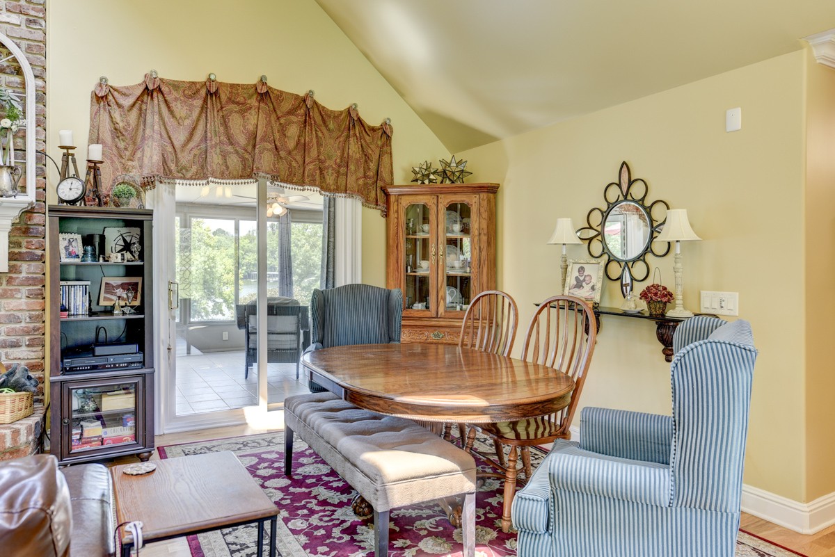 1069 Edgewater Circle Gallatin, TN 37066 - Photo 10 of 43 a dining room with furniture and wooden floor