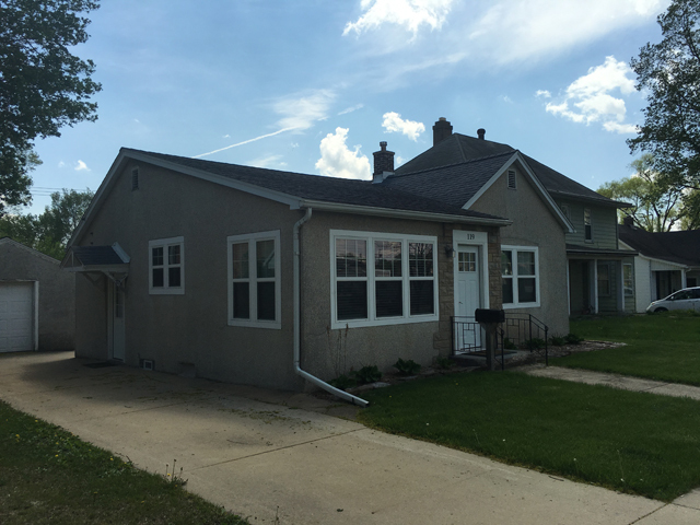 119 East Minnesota Street Spring Valley, IL 61362 - Photo 14 of 15 a front view of a house with garden