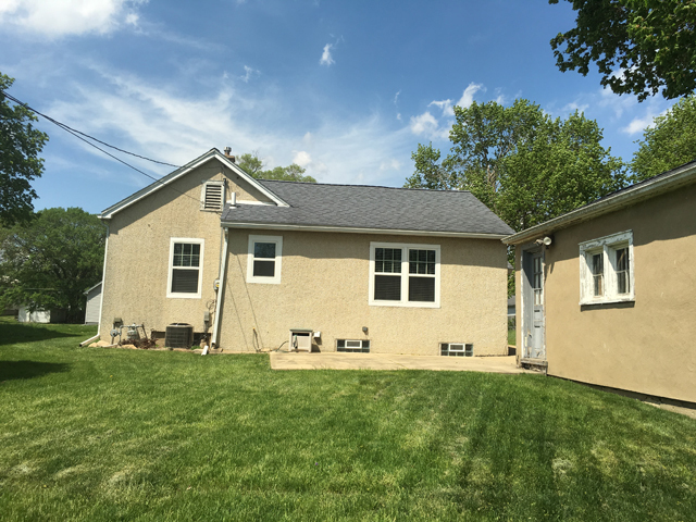 119 East Minnesota Street Spring Valley, IL 61362 - Photo 2 of 15 a view of a yard in front of a house with plants and large tree